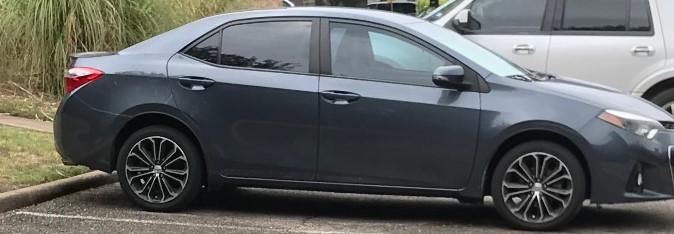 Sara Joy Davis' vehicle - grey 2015 toyota corolla 4-door passenger car